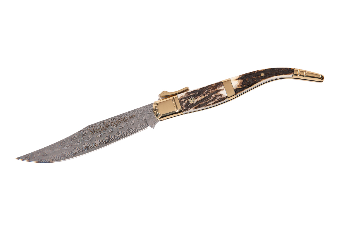 Collection folding knives with stag scales and brass bolsters